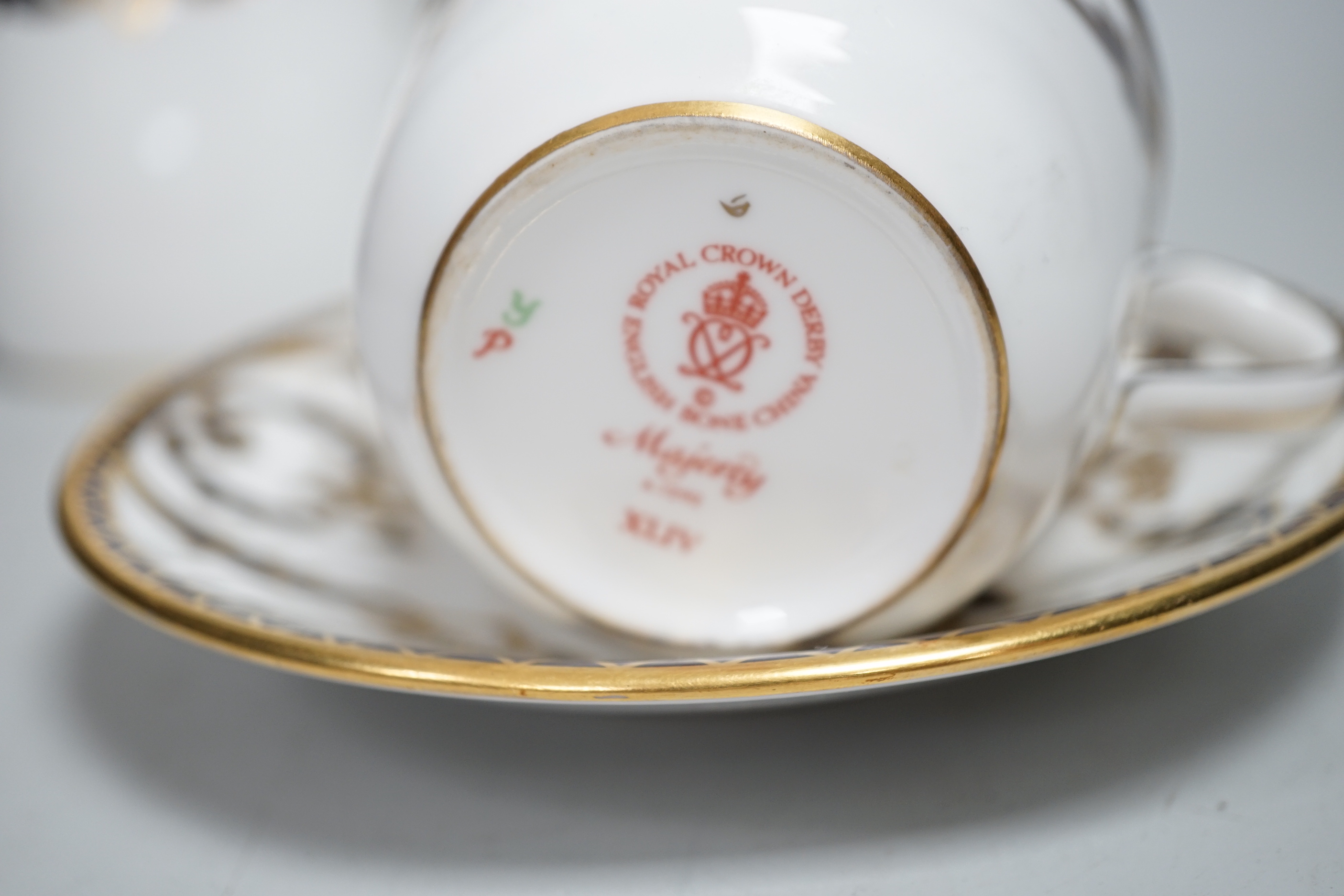 A Royal Crown Derby Majesty pattern service, largest 26cm wide